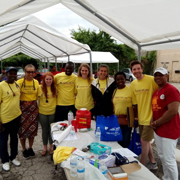 Mandela Fellows join a community health screening in West Philly led by CNHP’s Omolabake Fadeyibi